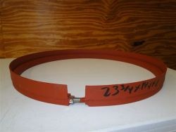 Type I adjustable manhole riser, a red steel ring with an expanding band joint and bolt